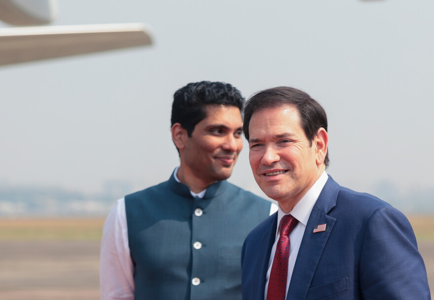 U.S. Secretary of State Marco Rubio walks past Dr. Rajesh Gawande, the secretary of protocol of the government of Maharashtra, ahead of boarding a plane en route to Jamnagar, India, at Chhatrapati Shivaji Maharaj International Airport in Mumbai, India, Wednesday, Oct. 21, 2026.