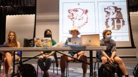 Kate McCaull, Sora Shirai, Pierce Seigne and Zane Schiffman preside over a discussion about the winning mascot logo design, during a Hanover High School council meeting