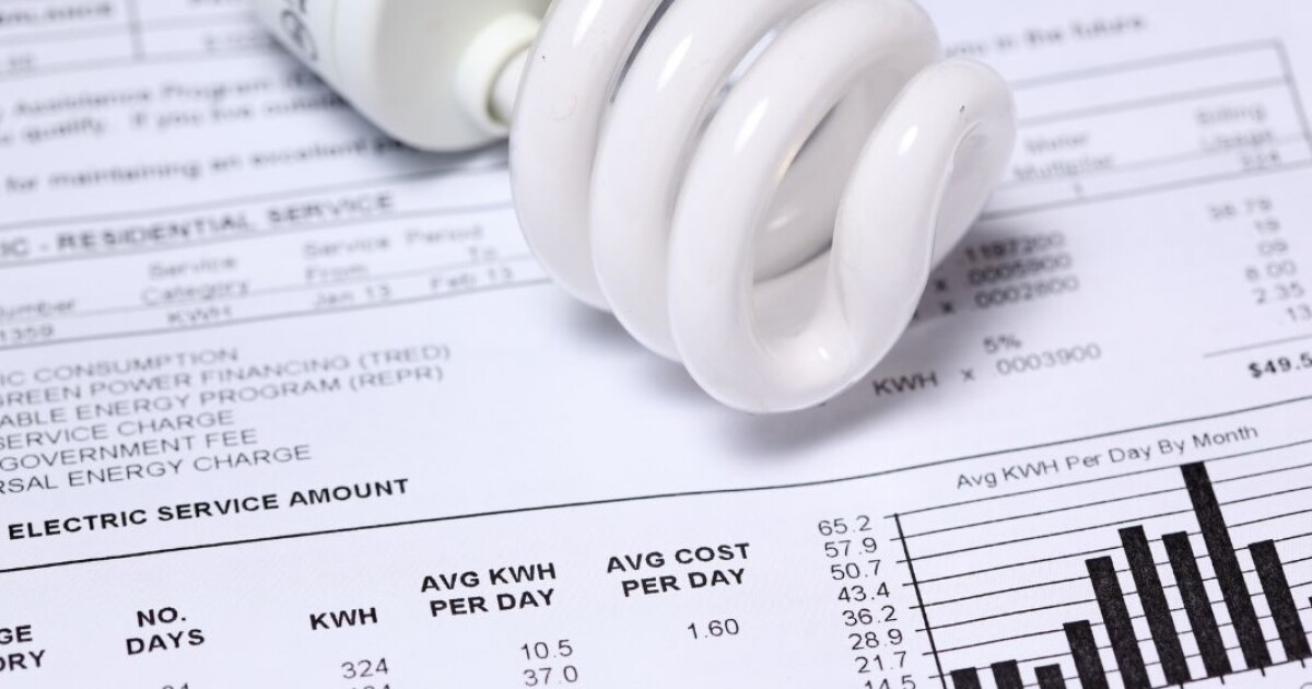 Photo: mainepublic.org Light bulb on top of an electric bill