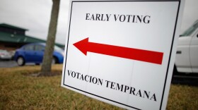 A sign lets voters know they can cast early ballots for the Florida primary election in January at the South Creek Branch Library in Orlando.
