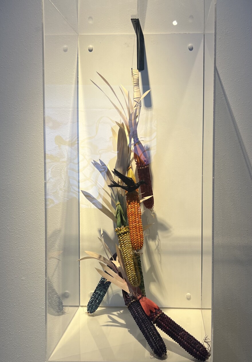 Corn strung together in various colors of the rainbow