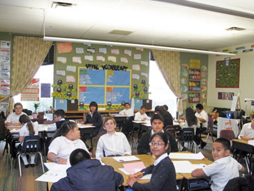 Fourth graders at Uplift Education's Peak Preparatory School work at their desks.