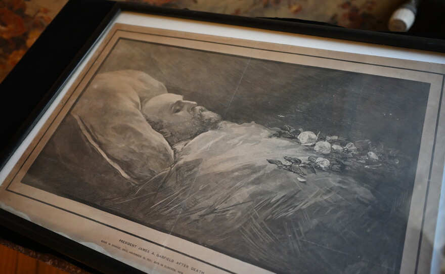 A sketch of James A. Garfield lying in a coffin