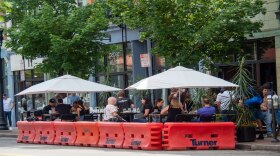 People gathered for food and drinks in the Over-the-Rhine neighborhood in the wake of the coronavirus pandemic, Saturday, May 16, 2020.