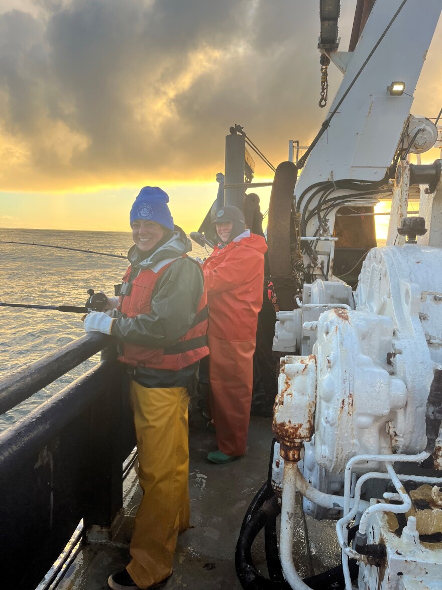 Sabrina Garcia and Alaska Department of Fish and Game Yukon Area Assistant Area Manager Sam Decker use rod and reel gear to catch chinook salmon In the northern Bering Sea while aboard the F/V Northwest Explorer in Sept. 2022.