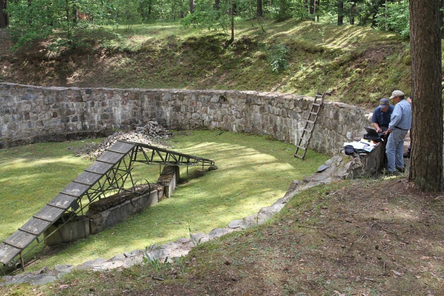This is where the Burning Brigade was housed. The apparatus in the middle is not the original, but ones like it were used as ramps so that the bodies could be stacked high and set alight. All the pits at Ponar were originally dug by the Russians to store fuel.