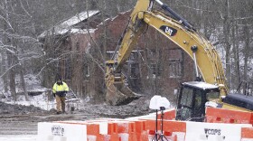 Rescue workers continue to search, Thursday, Dec. 5, 2024, for Elizabeth Pollard, who is believed to have disappeared in a sinkhole while looking for her cat, in Marguerite, Pa.