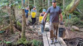 Volunteers with the ADK 46ers trail crew in July 2026 helping repair the Avalanche Pass trail.