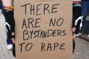 A sign held at a rally for Jane Doe in Ithaca, New York. October 4, 2026