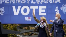 Joe Biden and his wife Jill Biden arrive for a drive-in campaign rally at Bucks County Community College on Oct. 24 in Bristol, Pa. Bucks County and three other suburban Philadelphia counties helped the president-elect win the swing state.