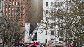 The four-alarm blaze started around 12:30 p.m. on Thursday, May 1, 2025. Over 100 firefighters responded to the downtown scene. The building, constructed in the 1960s and home to Paul William Beltz PC, is a total loss.