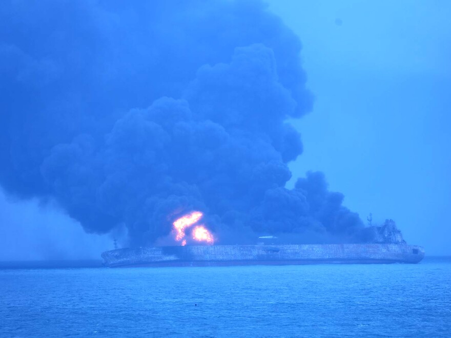 In this photo provided by Korea coast guard, the Panama-registered tanker Sanchi is seen ablaze after a collision with a Hong Kong-registered freighter off China's eastern coast on Sunday.