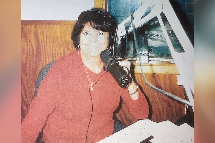 May Bunjes at KFTM in Fort Morgan, Colorado, around 2008. After Bunjes's brother died, she took his Spanish program, working the airwaves for six years. 