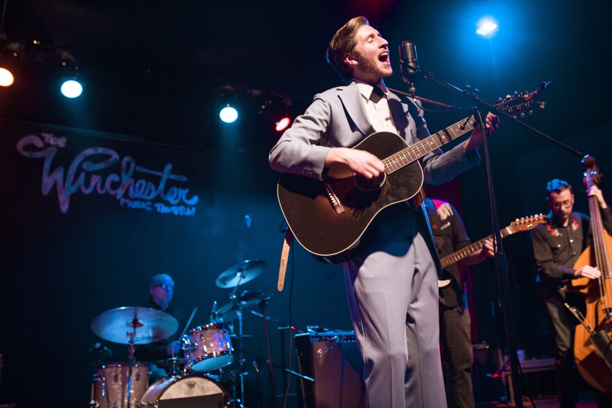 Cory Grinder wears his signature pale blue suit when he performs with The Cory Grinder Band.