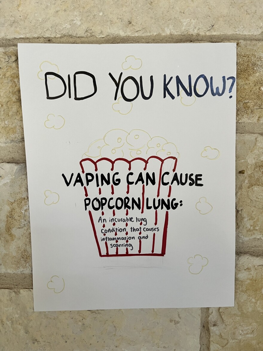 Sign warning of the dangers of popcorn lung, which can be caused by vaping
