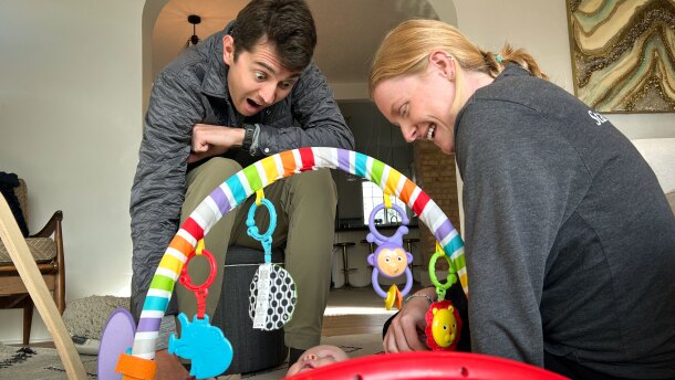 Scott Houck and Callie Silver play with their son, Wesley, at their home in Salt Lake City, Dec. 10, 2025. Houck and Silver currently rely on family for part of their child care and are looking into full-time day care options in the future.