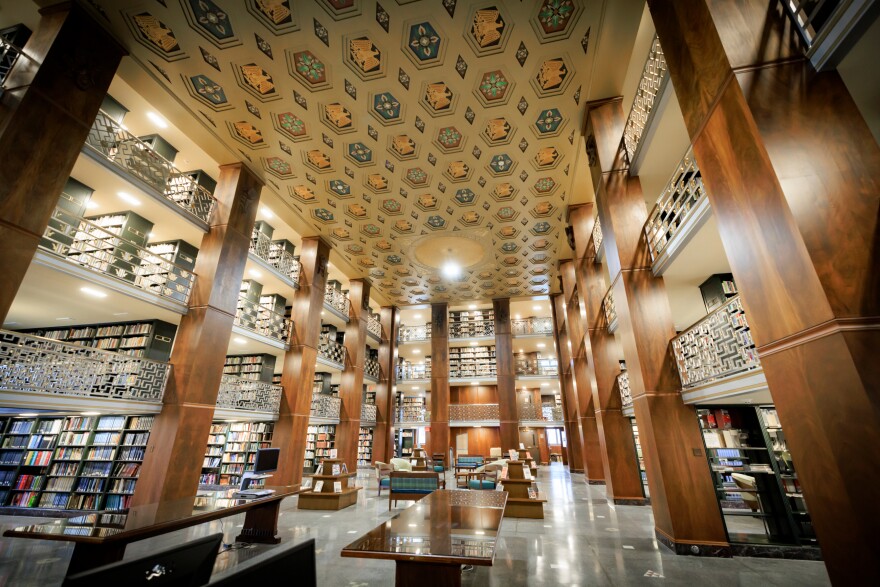 Shelves and tables inside the State Library of Pennsylvania.