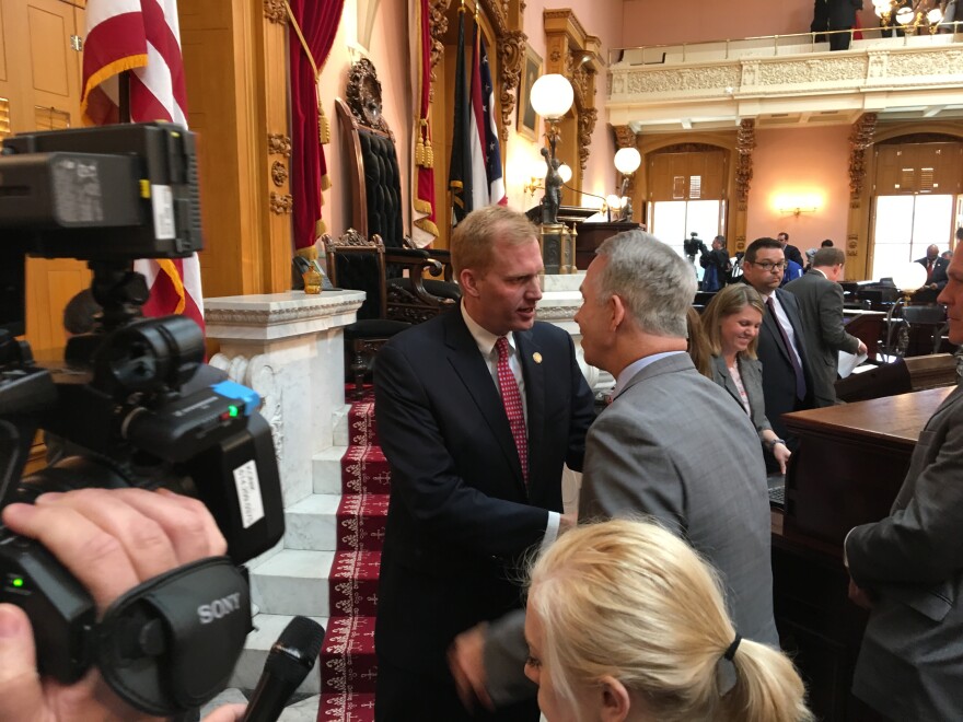 Newly elected Speaker Ryan Smith (R-Bidwell) shakes hands with Andy Thompson (R-Marietta), who he'd called Householder's "proxy" in the Speaker fight.