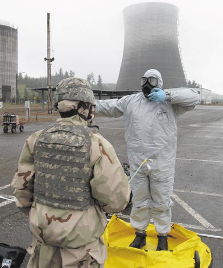 Soldiers practice decontamination protocol after a training scenario inside the nuclear reactor building at Satsop. Courtesy Satsop Business Park