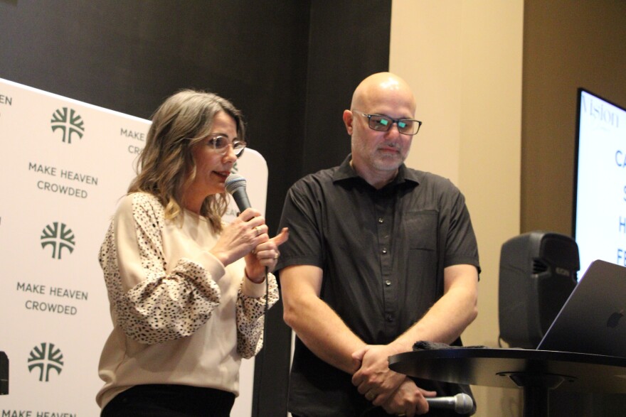 Samantha and Luke Wren address attendees during their Vision Dinner, an event to talk about upcoming plans for Tree City Church, on Nov. 16.