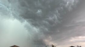 Ominous blue and gray storm clouds moving overhead