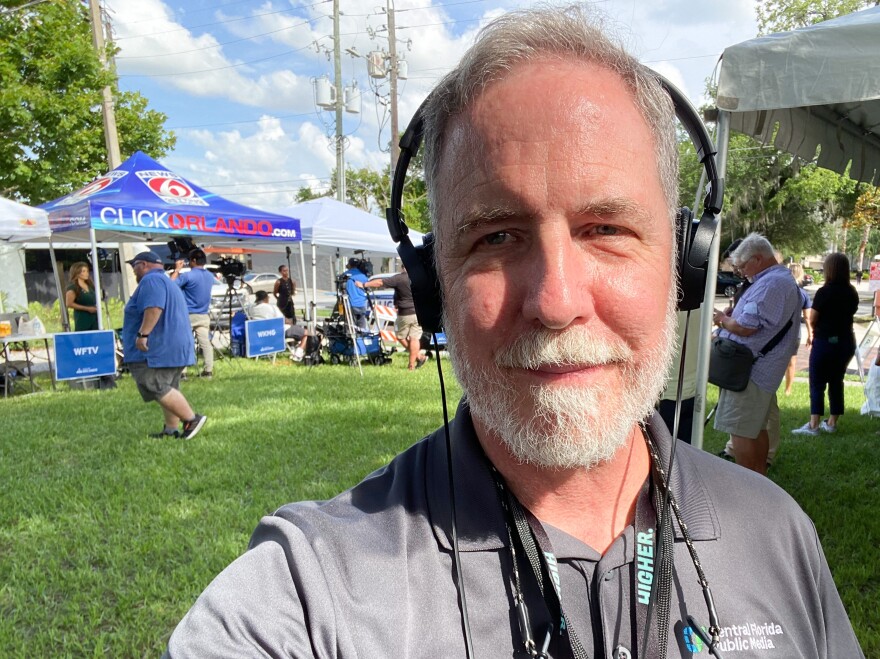 Central Florida Public Media reporter and editor Joe Byrnes is shown here at the scene of a story in Orlando on June 11, 2025.