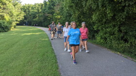 DeeAnna Sova leads the Hopkinsville Christian-County Public Library walking group on the Greenway Rail Trail.