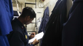 Sailor inspects a living area inside the USS Ramage. Aug. 30, 2023. Department of Defense