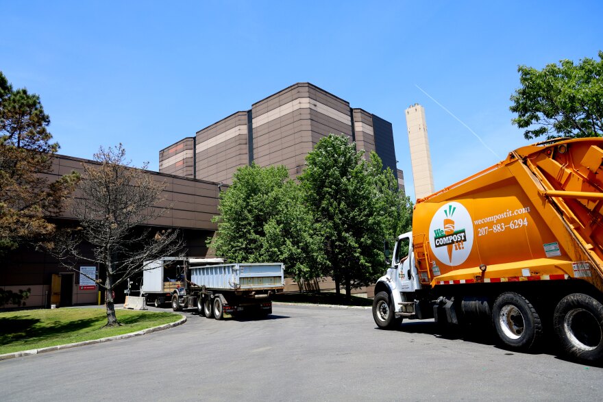 trucks-dropping-waste-at-ecomaine.jpg