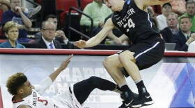 Butler guard Kellen Dunham (24) collides with Texas Tech forward Justin Gray (5) during a first-round men's college basketball game in the NCAA Tournament, Thursday, March 17, 2016, in Raleigh, N.C.