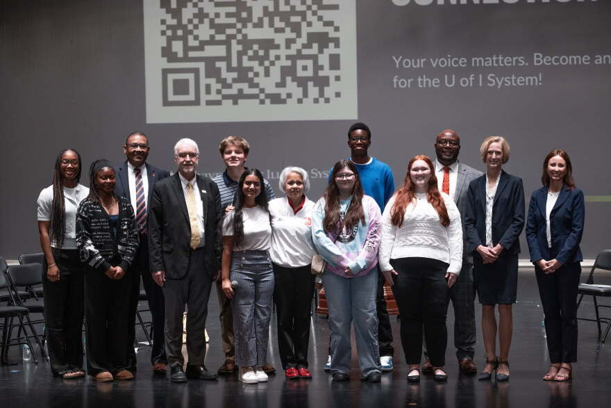 University of Illinois President Timothy Killeen and Chancellors Charles Isbell, Marie Maranda and Janet Gooch post with students and others during their 2026 Invested in Illinois tour.