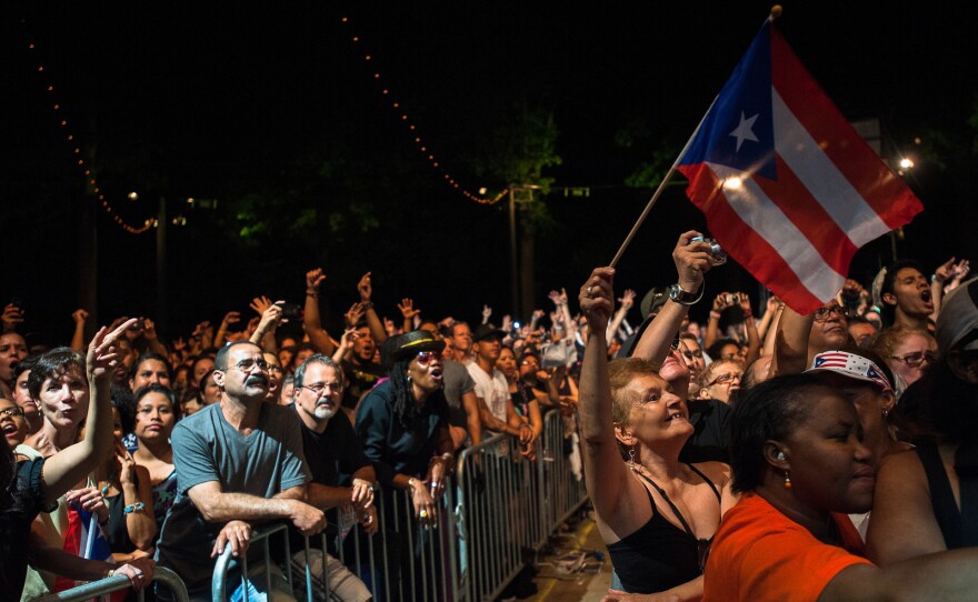 Puerto Rican flags waved throughout the crowd.