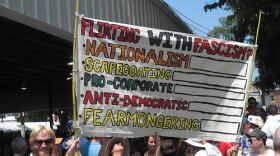 Kentucky voters with signs at Fancy Farm