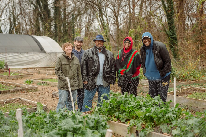 The garden congregation, from left, Kelly Sauskojus, Isaac Goodson, Chris Battle, Tiara-Lady Wilson and J.C. Carmichael pose for a portrait on Sunday, Nov. 12, 2022 at the Battlefield Farm in Knoxville, Tenn.