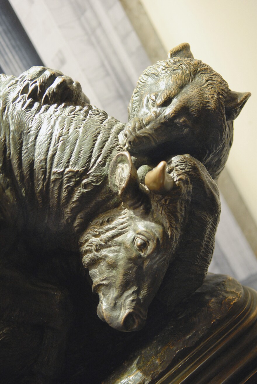 This statue in the Museum of American Finance symbolizes the struggle of the marketplace, says Chris Meyers, the museum's director of education. The statue used to sit outside the breakfast club at the New York Stock Exchange and members would rub the bull's horns for good luck.