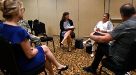 Evelyn Honea, Navy Ombudsman-at-Large, speaks with Norfolk Fleet and Family Support Services executive staff in an effort to assist the Master Chief Petty Officer of the Navy James Honea improve the quality of life for Sailors.