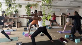 Black men doing yoga 