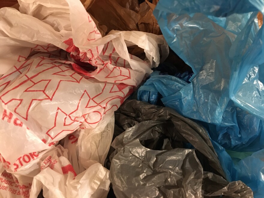 Three communities in Ohio have enacted bans on plastic bags.