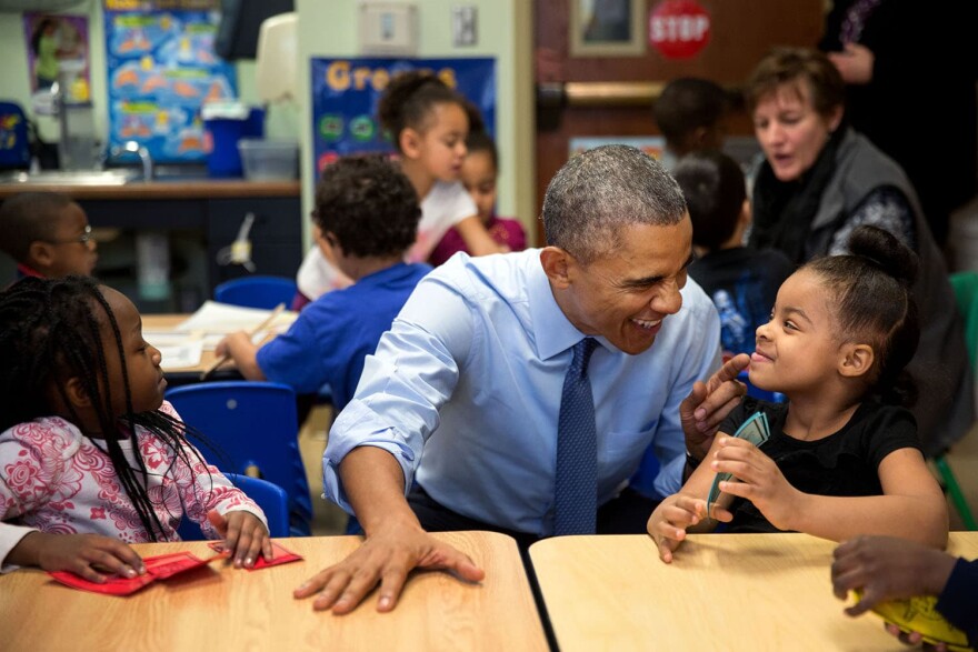 "While we were in Lawrence, Kan., we stopped at the Community Children's Center–one of the nation's oldest Head Start providers. The president sat next to Akira Cooper, right, and reacted to something she said to him." (Official White House Photo by Pete Souza)