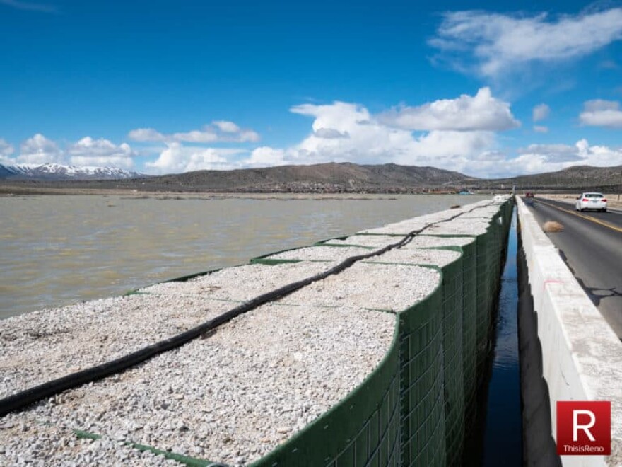 A barrier along a body of water.