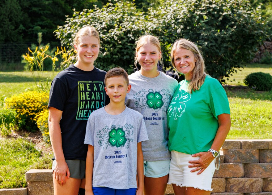From left, Claire, Charley, Evelyn and their mom, Sara Seifert at their family home in Carlock.
