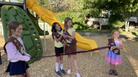 From left to right, Luna Beattie, Gwen DeRudder, Alma Rossello, and Georgia Owings prepare for a ribbon-cutting ceremony at Hendrick’s Park in Carbondale on June 20, 2023. The girls are members of Girl Scout Troop 17082 and helped choose a new design for the park when the Town of Carbondale was planning renovations.