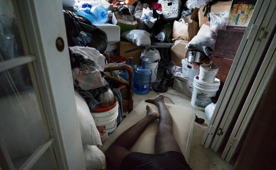 Ten evacuees from four different families are crowded into the six rooms of China Laguerre's home.