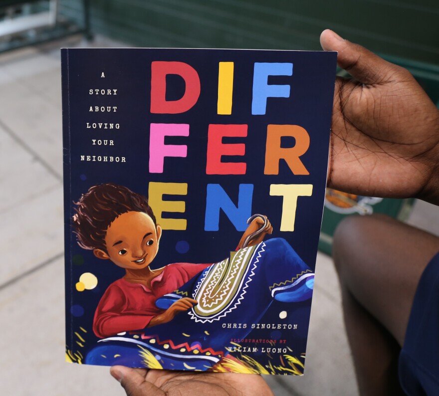 Chris Singleton's book "Different" about a boy who moves from Nigeria to Charleston teaches kids to love one another despite their differences.