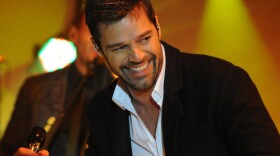 Ricky Martin says his time with the Puerto Rican boy band Menudo "was all about discipline. ... Now, it's  about not wearing masks and just being who I am."