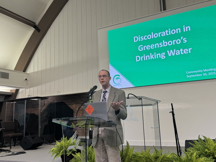 A photo of Greensboro Water Resources Director Mike Borchers speaking at a recent community meeting in South Greensboro