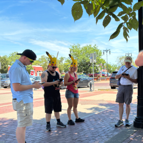 A group of Pokémon Go players meet for August's Community Day.