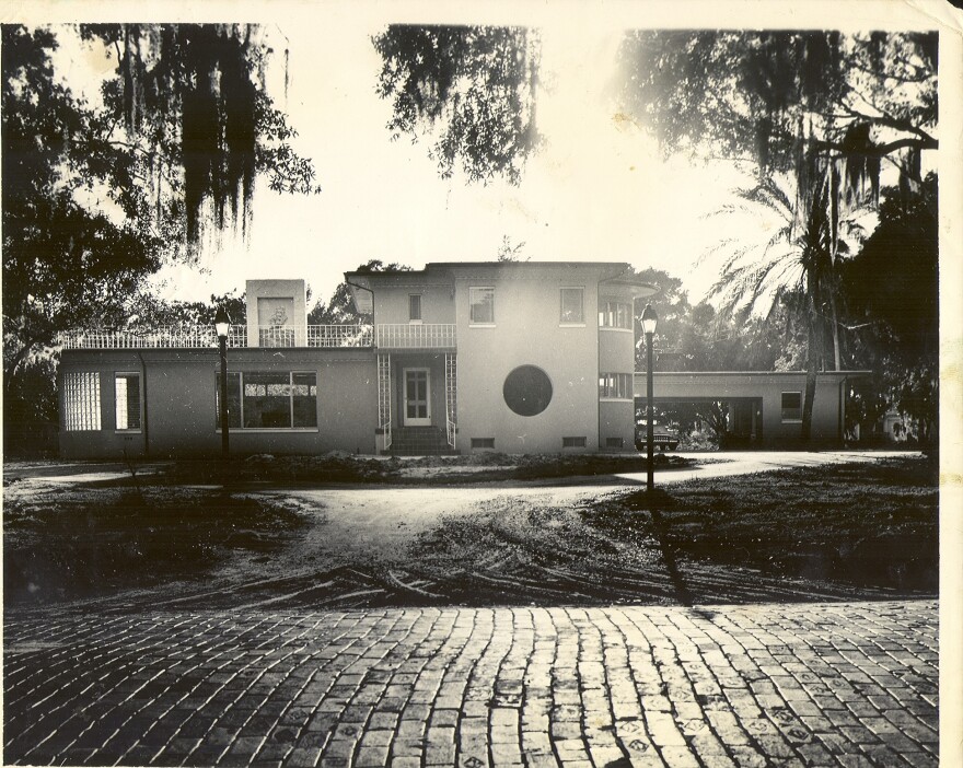 Black and white photo of outside of house 
