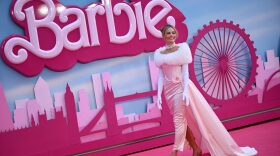 Australian actress Margot Robbie poses on the pink carpet upon arrival for the European premiere of "Barbie" in central London.
