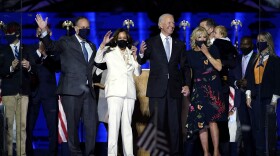 From left, Doug Emhoff, husband of Vice President-elect Kamala Harris, Harris, President-elect Joe Biden and Jill Biden, on stage together, Saturday, Nov. 7, 2020, in Wilmington, Del.